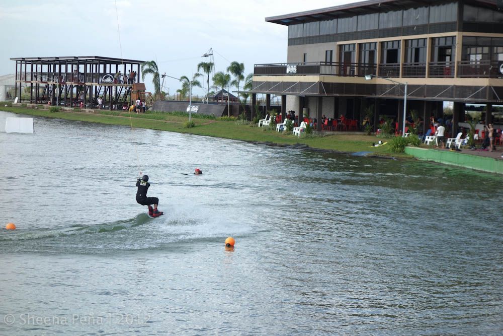 pro wakeboarder in a curve at republ1c nuvali lake